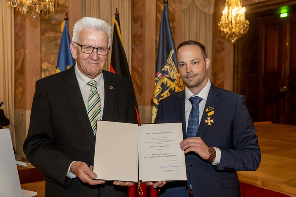 Ministerpräsident Winfried Kretschmann (l.) und Patrick Haag (r.)
